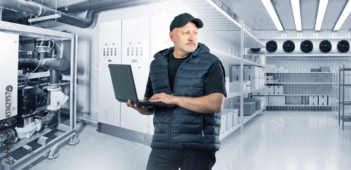 Worker in industrial refrig...