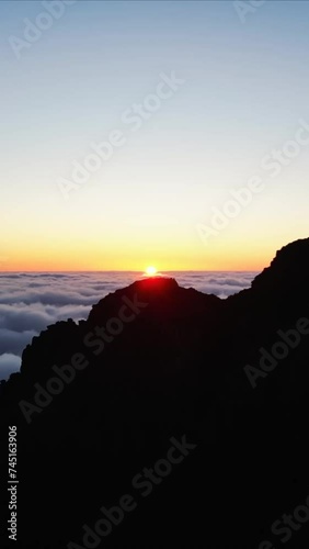 Vecrtical video 9:16 Madeira Portugal mountain clouds sunset night aerial	