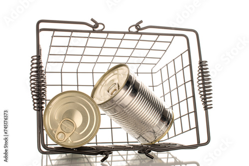 Two metal canned meat in a basket, macro, isolated on white background.