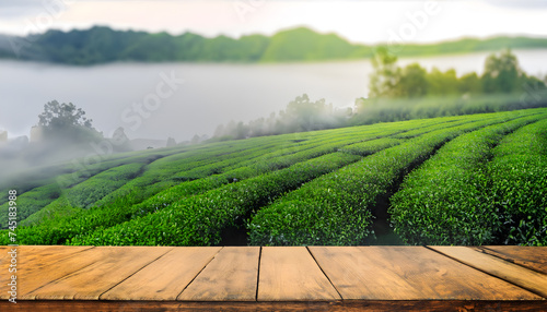 Empty wood table top and Tea farm background. Mock up for display of product.