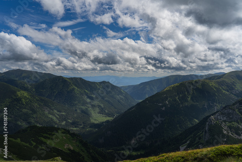 Mountain landscape in the Polish mountains in summer, sky with storm clouds. © Dmitri