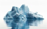 A large iceberg drifts in the middle of the ocean, showcasing its impressive size and presence in the vast expanse of water