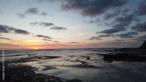 Coastal Pacific sunset surf scenes at Swamis Reef Surf Park Encinitas California.