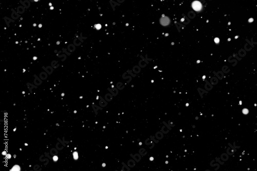 night snowfall on a dark background