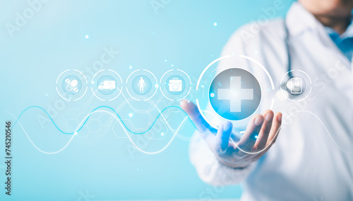 Doctor hold virtual medical network connection icons. Pandemic develop people awareness and spread attention on their healthcare, rising growth in hospital and health insurance business.