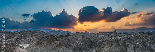 Fototapeta Naklejka Na Ścianę i Meble -  Scenic wide Sunset panorama over Red Sea Hills mountain chain. Very sharp mountain peaks. Hurghada, Egypt