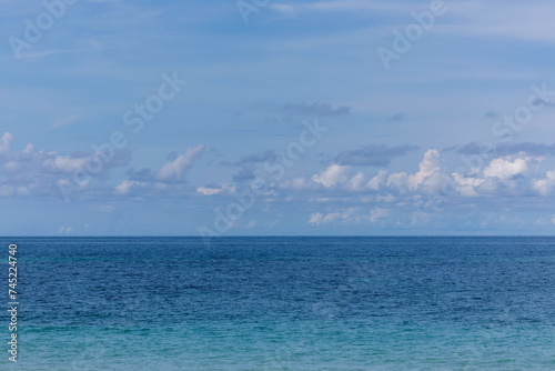 Stunning beautiful sea landscape beach with turquoise water. Beautiful Sand beach with turquoise water. Beautiful tropical beach with blue sky and white clouds.