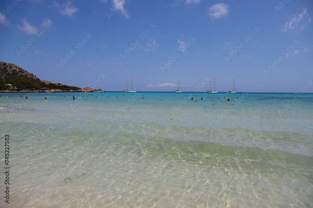 Turquoise sea water in Cala Agulla beach in Mallorca Islands, Spain Turquoise sea water in Cala Agulla beach in Mallorca Islands, Spain
