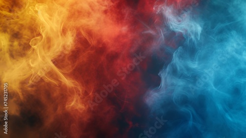 Abstract background of red, blue and yellow smoke isolated on black background