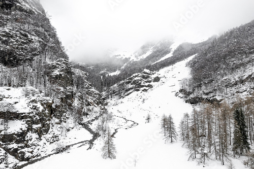 Winter landscape in wild Alps, Italy photo