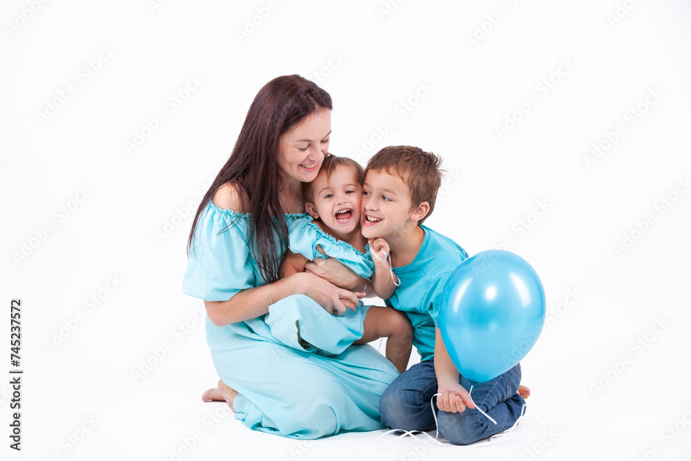 Happy mother with children on a light background Happy mother with children on a light background