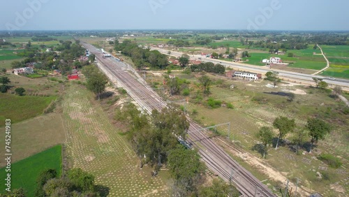 Drone aerial view of highway in india with cars passing by photo