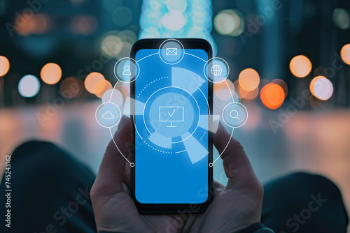 A person hand holding smart phone with business icon