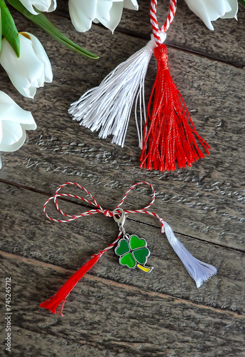 Martisor is a traditional Romanian (balkanic) symbol of spring, typically a red and white thread worn as a talisman for good luck and health. photo