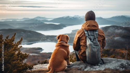 Unrecognizable traveler sitting on hill with dog