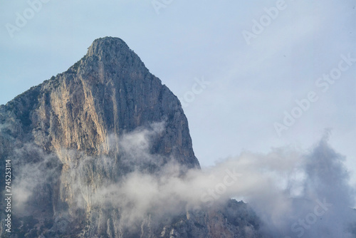 Foggy weather, Baunei, rocky coast near Sa Perda Liana. Ogliastra, Sardinia, Italy
