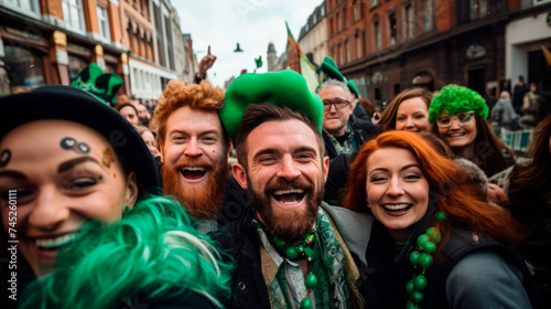 Joyfully clad in holiday garb, a convivial group captures a selfie, celebrating St. Patrick's Day with smiles and laughter. joyous nature of public celebrations. © stateronz