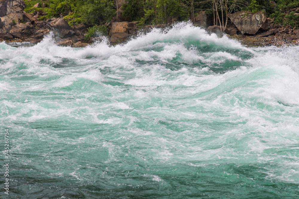 Close-up of a raging river and rapids, Niagara Falls, Canada Close-up of a raging river and rapids, Niagara Falls, Canada