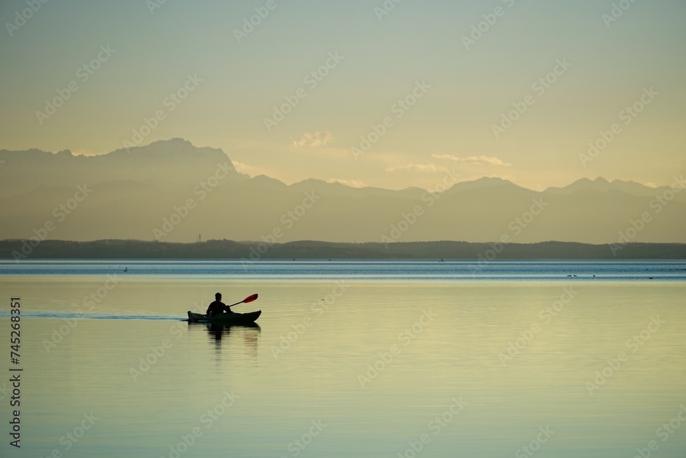 Kayak on a lake close to the mountains