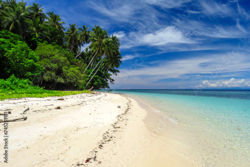 Fototapeta Naklejka Na Ścianę i Meble -  Clean beach of unpopulated Papaya Island in Nabire, Central Papua, Indonesia.