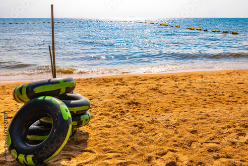 Inflatable floating tires on the beach in Pattaya Thailand.