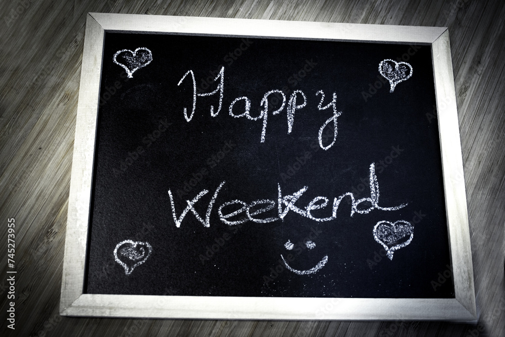 Fototapeta premium Happy weekend written with chalk