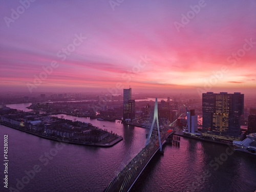 Pink sky - Aerial view of the skyline of Rotterdam at sunrise