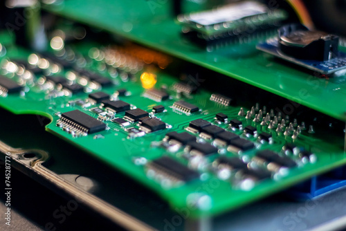 Green motherboard and transistors closeup macro photography photo