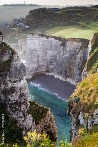 coastal landscape along the Falaise d'Aval the famous white cliffs of Etretat village