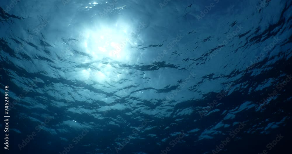 sun ray and sun beam scenery underwater waves on surface of water slow ocean scenery for background