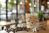 Latte art adorns a beverage in an ambient coffee shop, its creamy swirls inviting a taste of tranquility. Elegant patterns float on a latte's surface, set against the backdrop of a softly lit