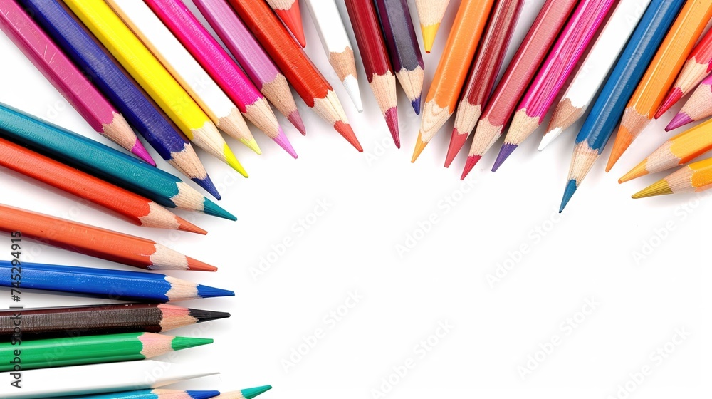 colored sharpened pencils on a white background, school supplies for drawing