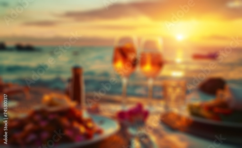 Blurred backdrop. Romantic sunset dinner on the beach.