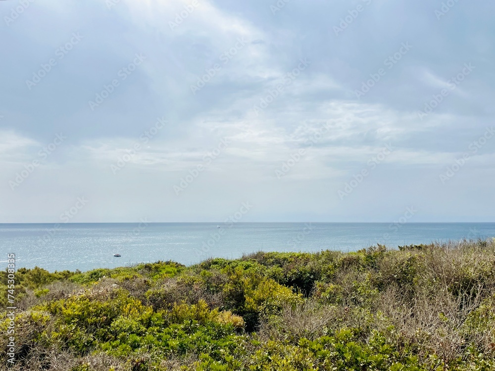 Rocky coastline, ocean horizon, rocks at the ocean, cliffs Rocky coastline, ocean horizon, rocks at the ocean, cliffs