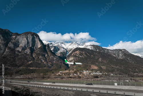 Landing plane in the Tyrolean Alps.