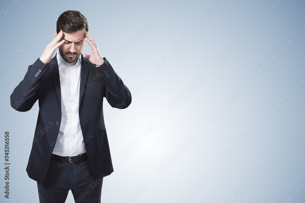 Abstract image of stressed businessman on light gray background with mock up place. Bad job decision and mistake concept. Abstract image of stressed businessman on light gray background with mock up place. Bad job decision and mistake concept.