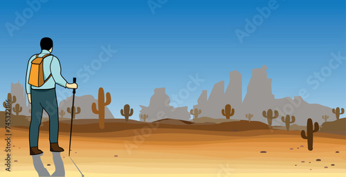 hiker in western desert with cactus