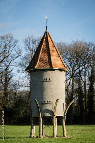 bird house grounds of huis Doorn manor, Netherlands on sunny day. duiventil hut for doves in garden of residence of former German Emperor Wilhelm II photo