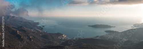 View from mountains to the coast and the sea during sunset, Adriatic sea, Budva, Monenegro