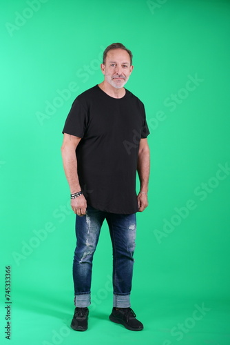 Man  posing in studio green screen, variety of emotions, unedited photos