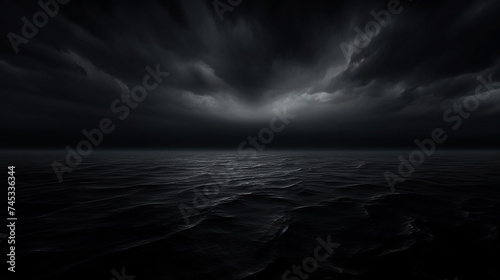 Infinite Black Horizon is a phrase that refers to a dark background image with no visible end or limit. photo