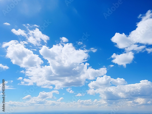 Blue sky background with clouds. © Andrei