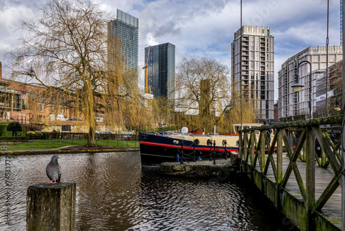 Solitary Pigeon on Mooring Post, in Castlefield, Manchester, England 