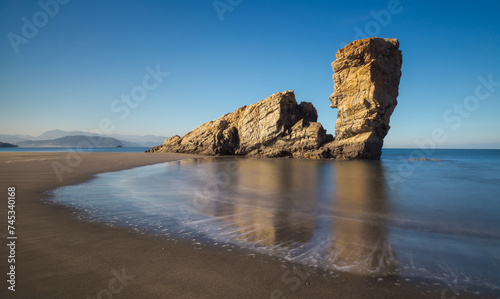 Iconic rock formation at playon de bayas beach, Asturias