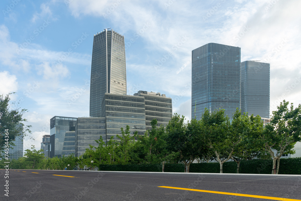 empty asphalt road with modern office buildings in downtown. empty asphalt road with modern office buildings in downtown.
