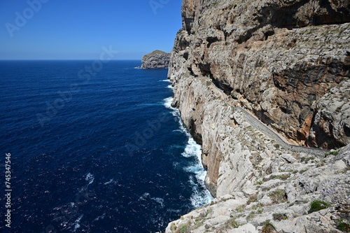 A stairway called Escala del Cabirol, cut into the cliff, leads from the top of the cliff at Capo Caccia down to the entrance to Neptune's Grotto
 photo