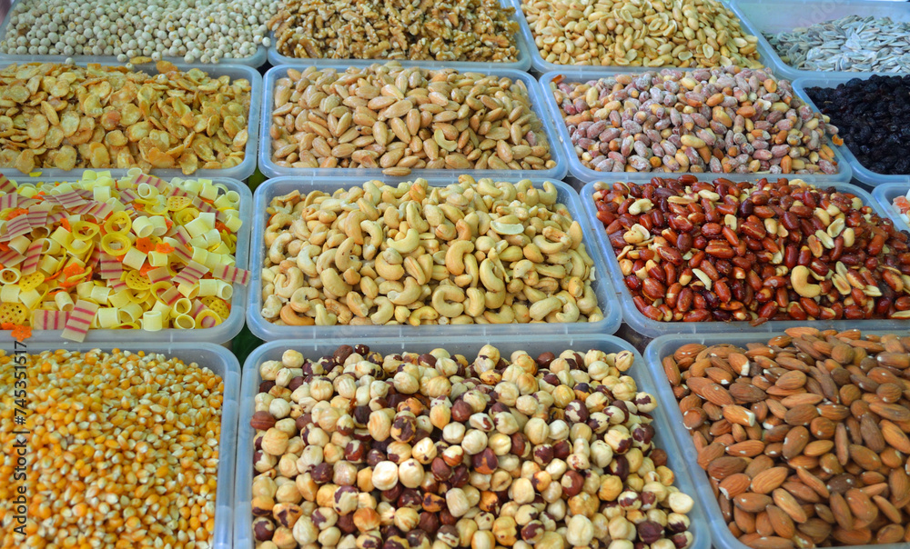 Nut Display including Cashews, Peanuts, Almonds, Pine Nuts and Hazel Nuts.