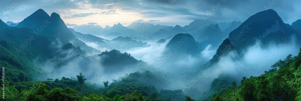 Majestic Green Mountains shrouded in morning mist - obrazy, fototapety, plakaty 