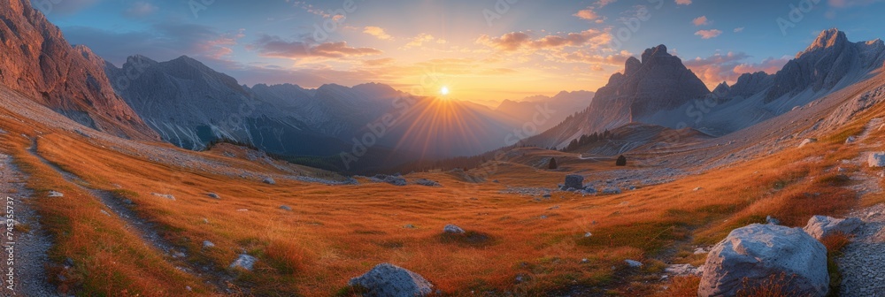 Warm sunset rays on sloping mountain hills