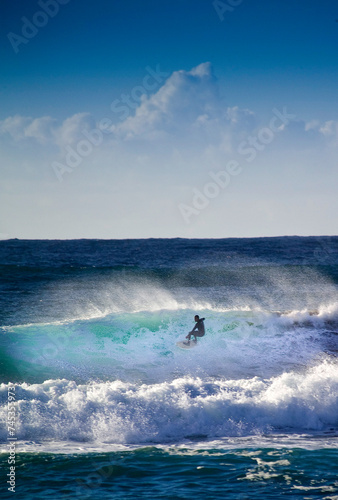 Photography surfing the waves, Surfing among the breakers in Porto Ferro